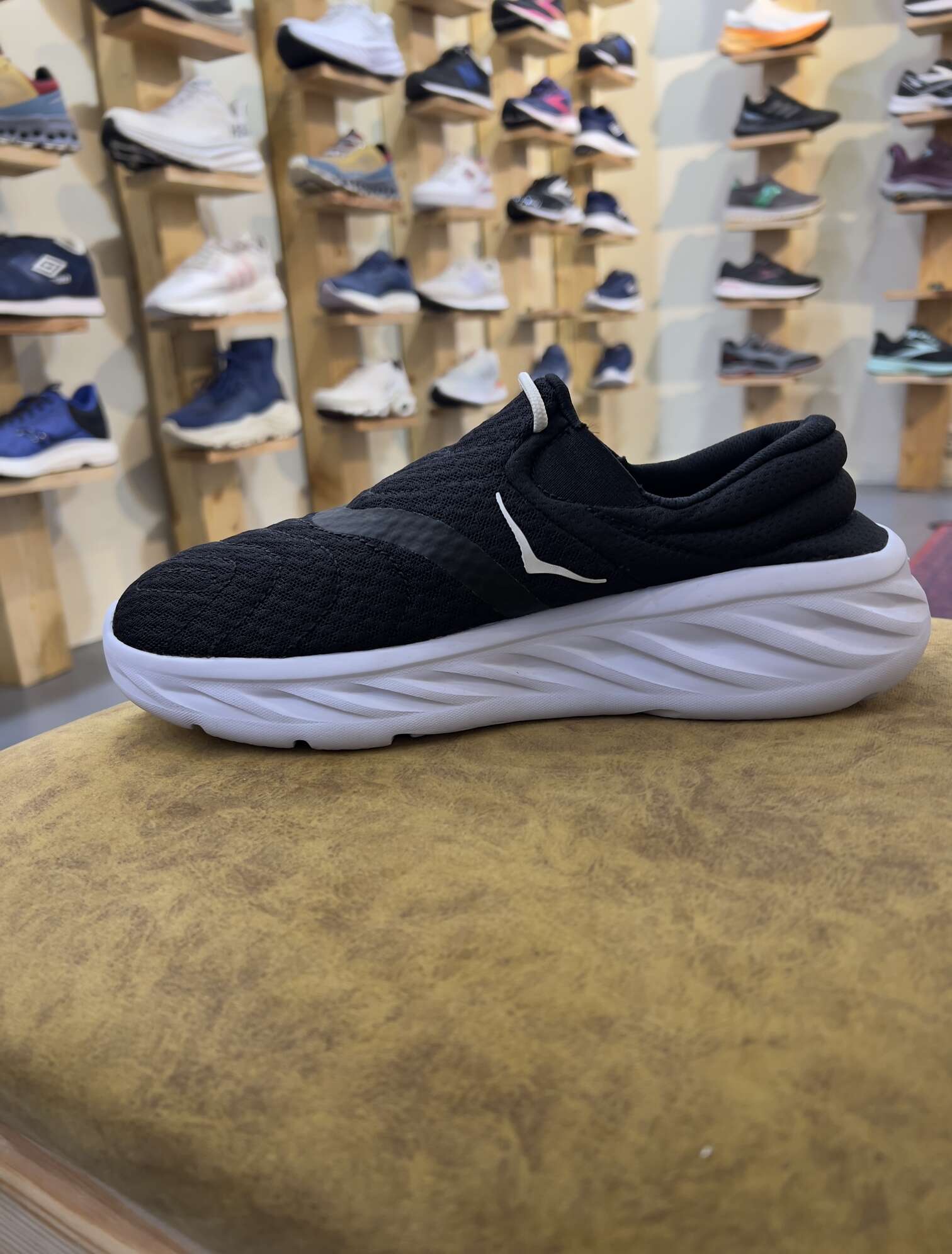 Hoka Ora Recovery Slide Black White Medial View hoka ora recovery slide black white 1119398 bwht medial view
