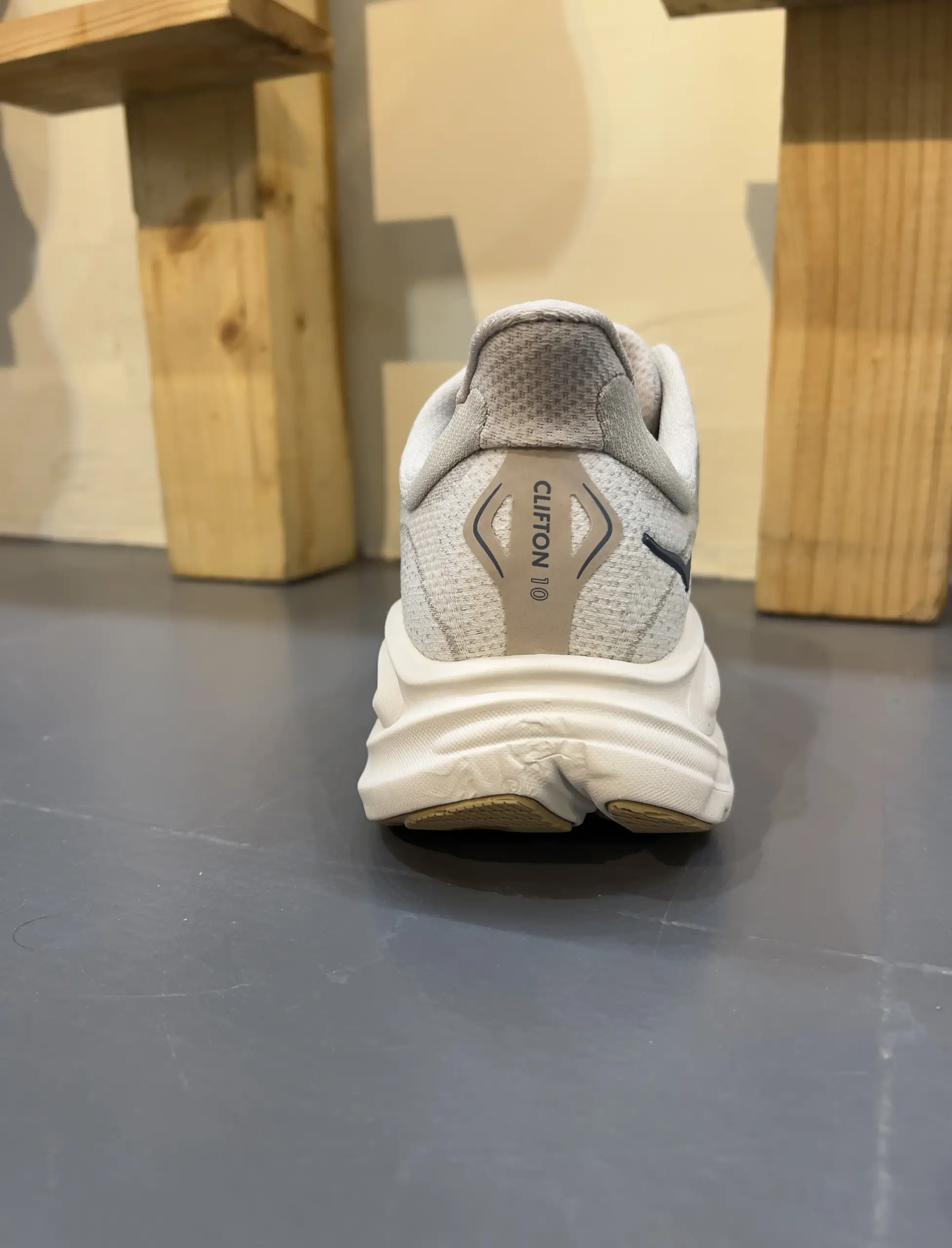hoka-clifton-10-putty-grout-1162032-ptyg-back-view hoka clifton 10 putty grout 1162032 ptyg back view