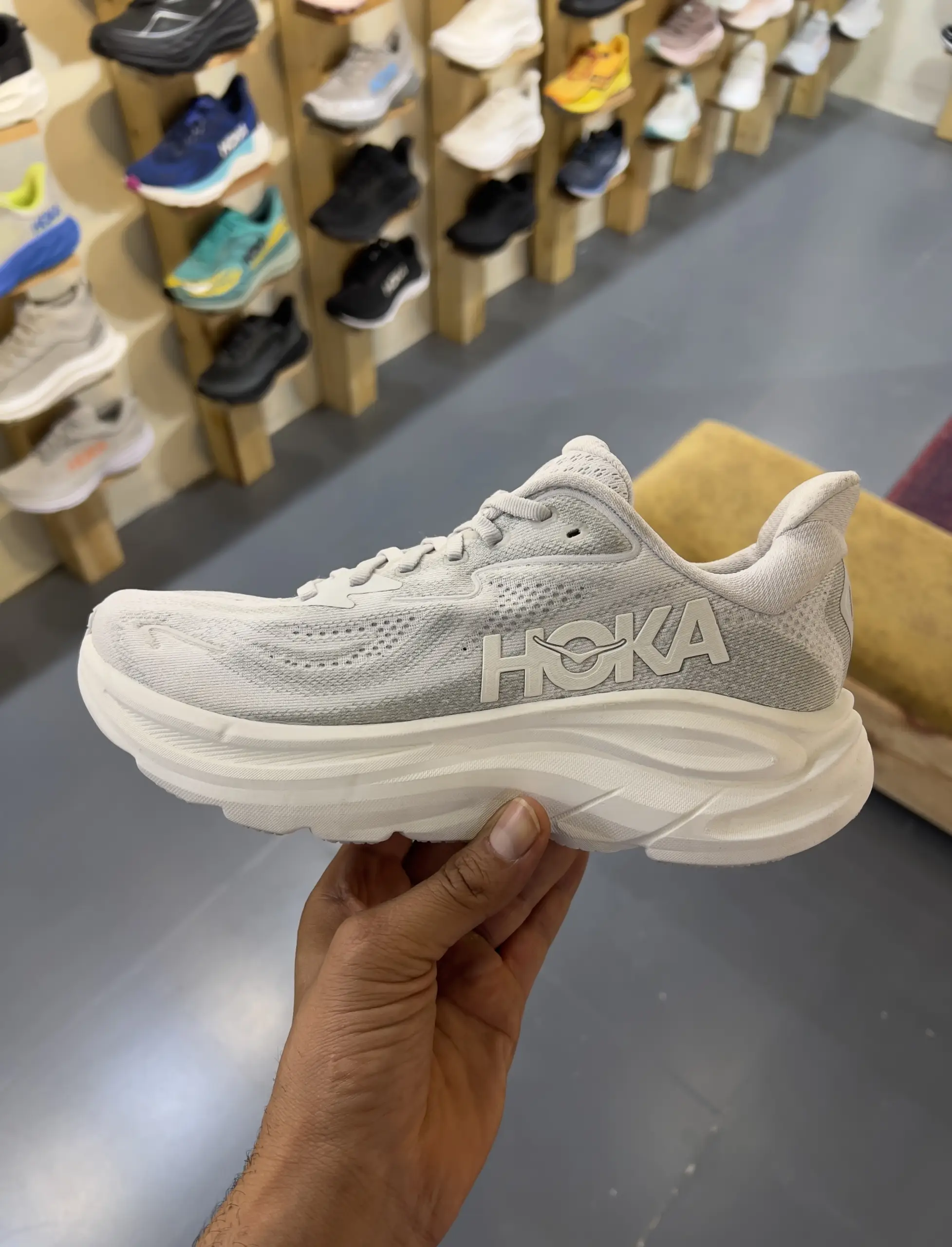 hoka-clifton-10-cosmic-grey-stardust-1162031-crds-hand-view hoka clifton 10 cosmic grey stardust 1162031 crds hand view