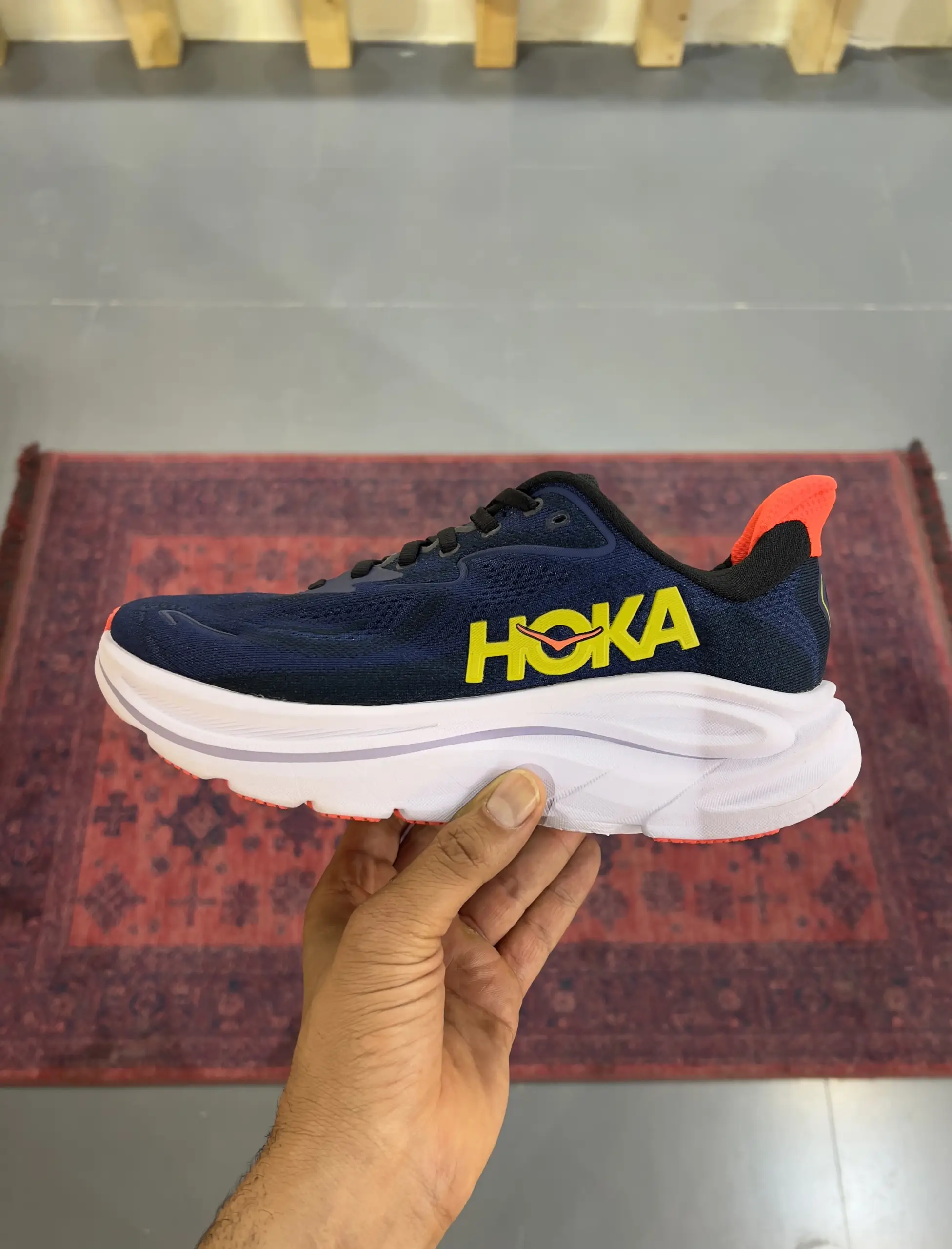 hoka-clifton-10-midnight-blue-starlight-glow-1162050-mlst-hand-view hoka clifton 10 midnight blue starlight glow 1162050 mlst hand view